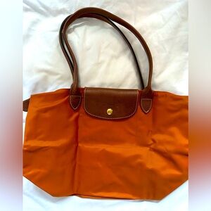 Longchamp Le Pliage small orange shoulder bag